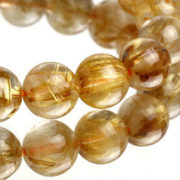 Golden_rutilated_quartz_beads_by_ariyangems